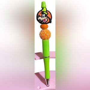 Handcrafted Goofy Themed Green and Orange Beaded Pen